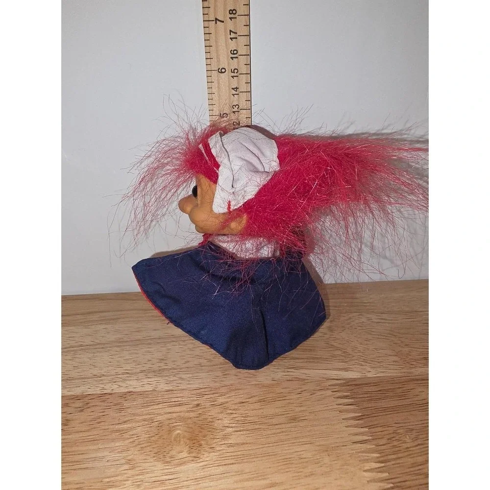 vintage Russ Berrie Florence Nightingale Nurse Troll Doll featuring bright red